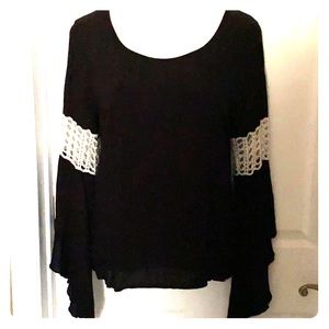 Elan Black Top with crocheted detail sleeves